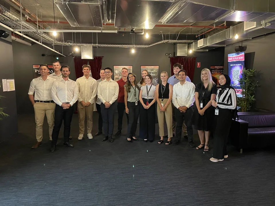 A corporate team celebrating together at Escape This